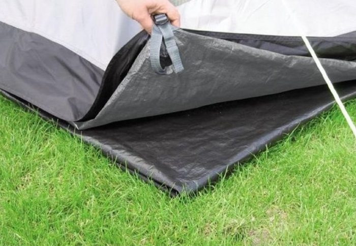 Tent footprint underneath set up ten