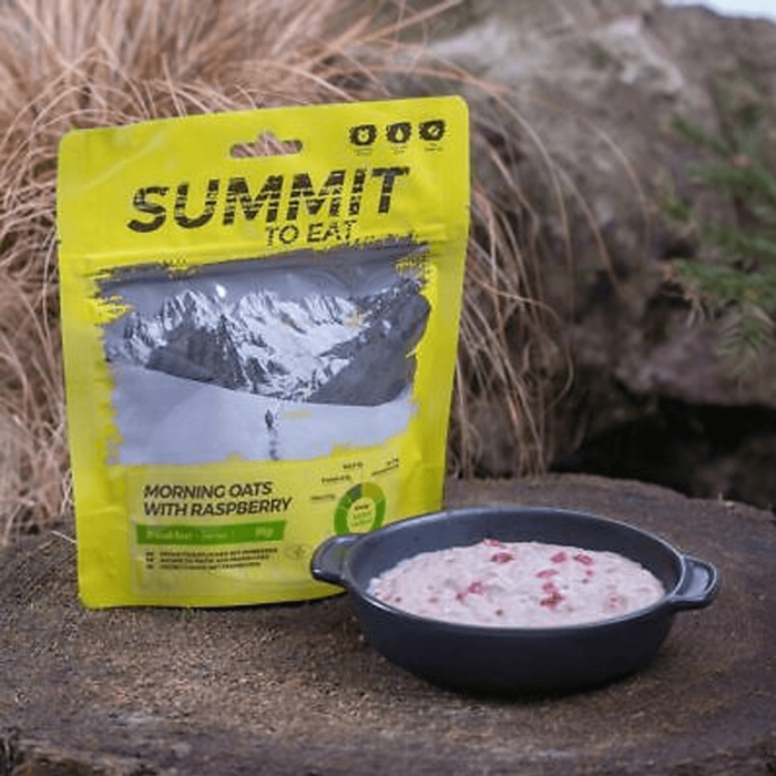 Bowl of porridge next to the packet. The text on the pack reads: Summit to Eat. Morning Oats with Raspberry.