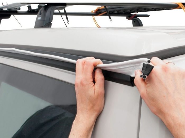 A pre-attached awning rail